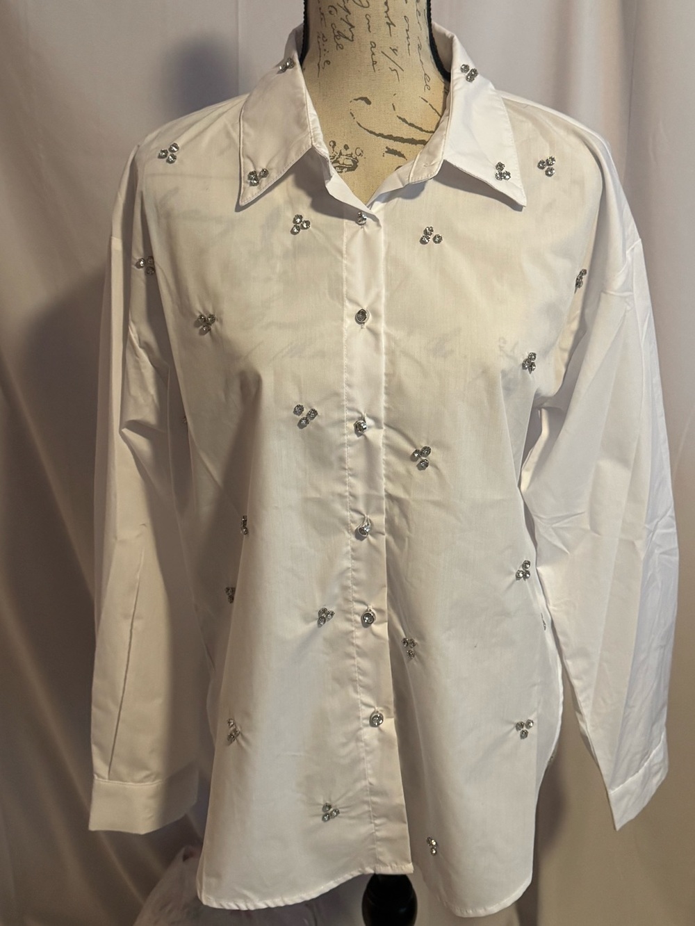 Kiwi white blouse with rhinestone clusters